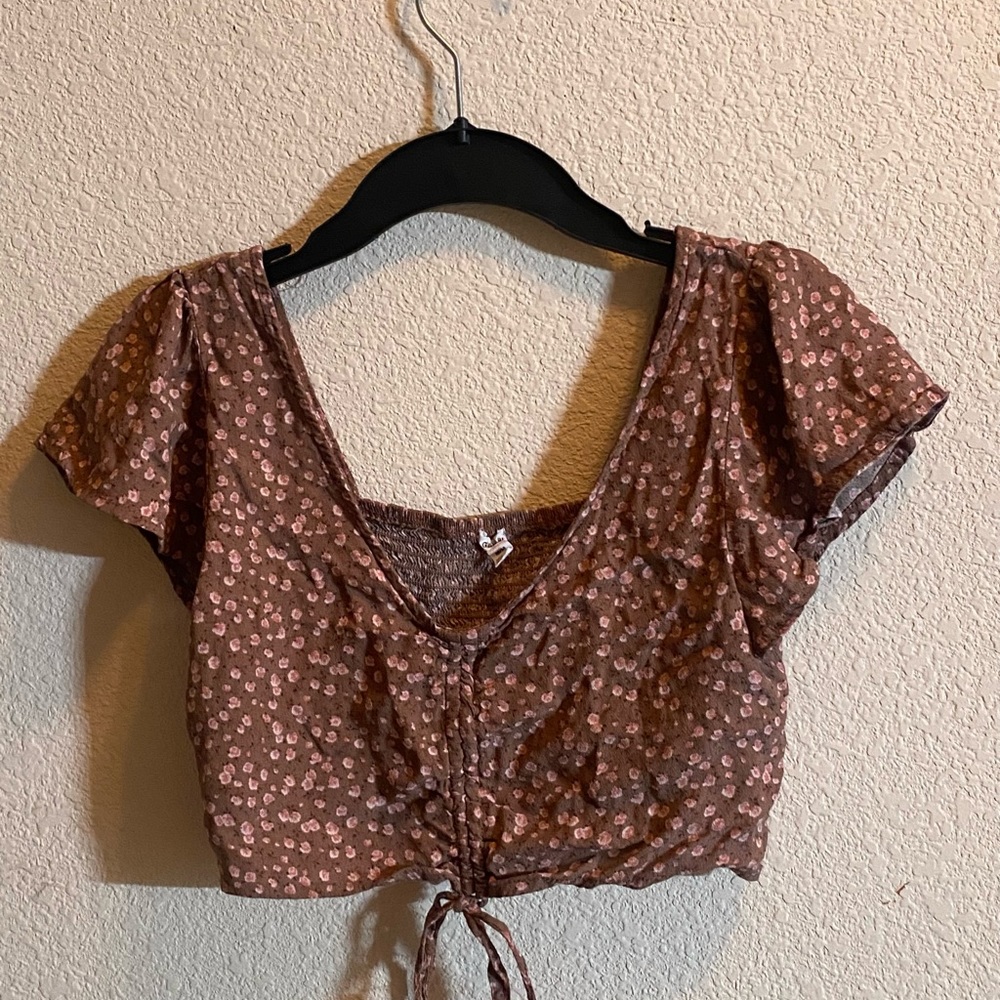 Cropped floral adjustable blouse from Garage, size medium,good condition